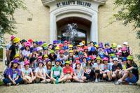 While Ms WONG Pui Ki and her College mates in Australia were taking a group photo in the orientation week, water was sprayed on them unexpectedly!